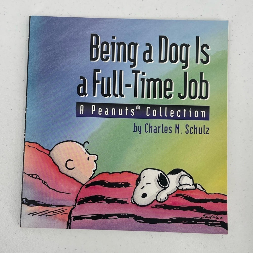 Being a Dog Is a Full-Time Job - A Peanuts Collection - by Charles M. Schulz